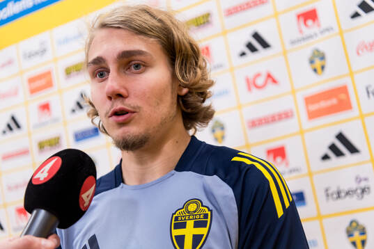 Sebastian Nanasi of Sweden in mixed zone