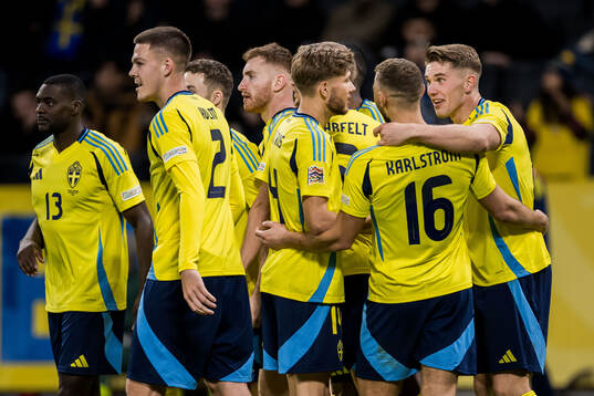 Dejan Kulusevski of Sweden celebrates with team mates 4-0