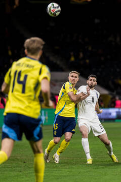 Carl Starfelt of Sweden and Rashad Azizov of Azerbaijan