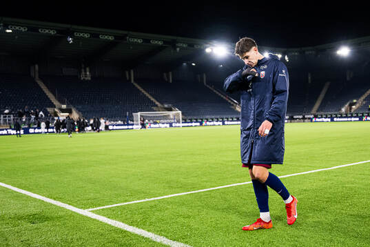 Eivind Fauske Helland of Norway looks dejected