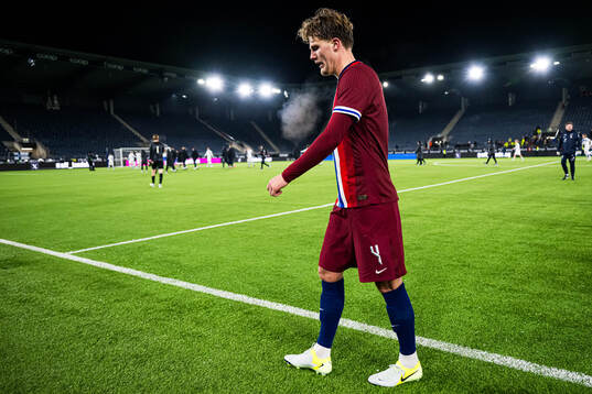 Leo Fuhr Hjelde of Norway looks dejected
