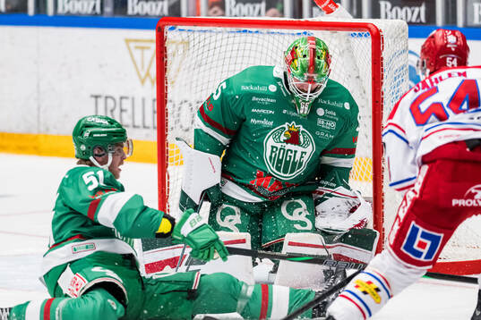 Rögles Calle Själin och målvakt Christoffer Rifalk