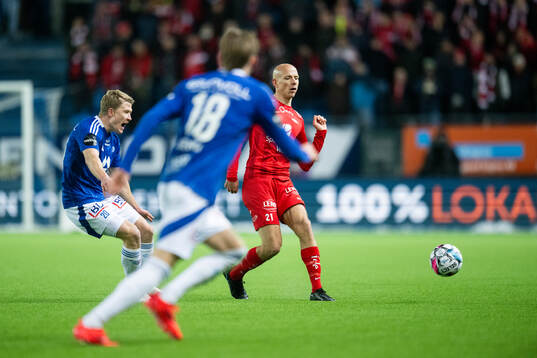 Kristian Eriksen of Molde and Ruben Kristiansen of Brann