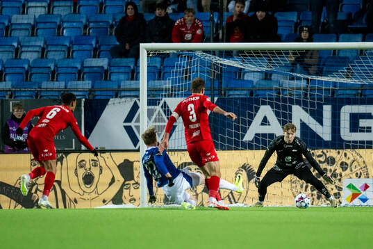 Ola Brynhildsen of Molde scores the 1-0 goal behind