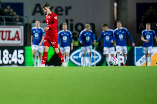 Players of Brann look dejected