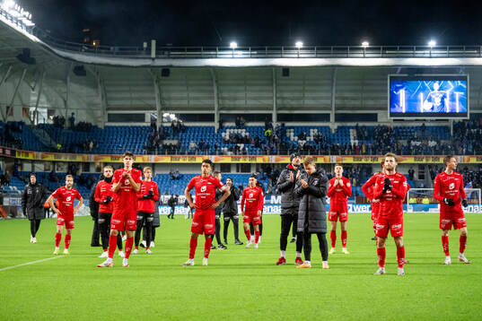 Players of Brann look dejected