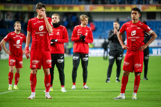 Eivind Helland and Japhet Sery Larsen of Brann look dejected
