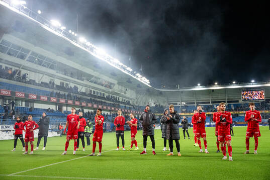 Players of Brann look dejected