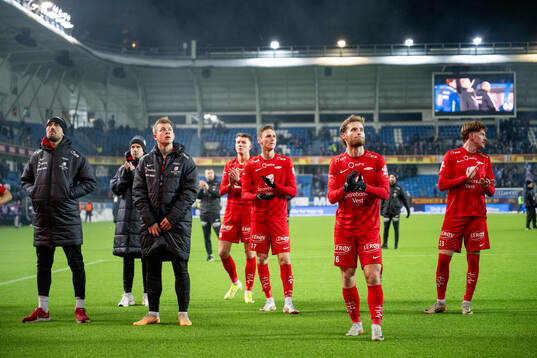 Players of Brann look dejected