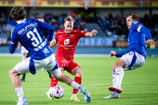 Bård Finne of Brann and Martin Bjørnbak of Molde