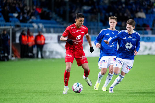 Japhet Sery Larsen of Brann, Mads Enggård of Molde and