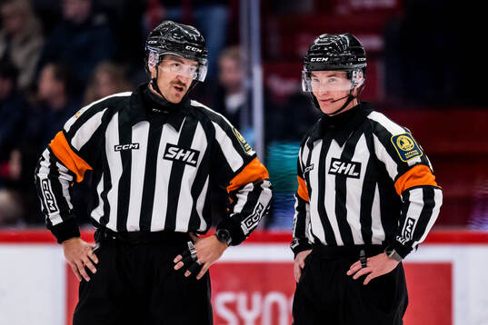 Domare Kristoffer Folkstrand och Domare Alexander Österberg