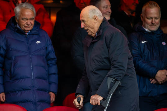 King Harald V of Norway in the stands
