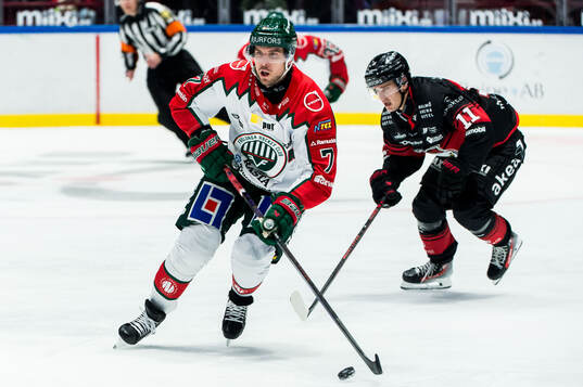Frölundas Henrik Tömmernes och Malmö Redhawks Nikola