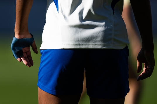 A protection for injured fingers worn by Madelen Janogy of