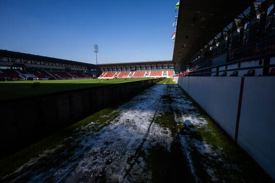Snow at the side of the pitch of Stadion Dubocica
