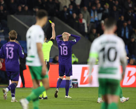 Adam Ståhl of Djurgården receives  a yellow card