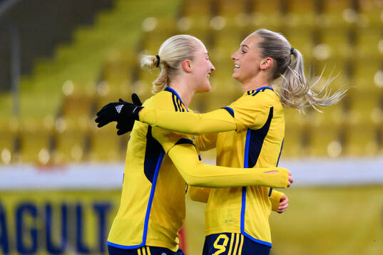 Wilma Leidhammar and Ellen Wangerheim of Sweden celebrate