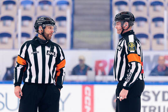 Domare Marcus Linde och Domare Daniel Eriksson