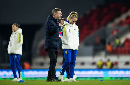 Head coach Peter Gerhardsson and Rebecka Blomqvist of Sweden