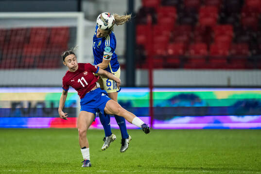 Miljana Ivanovic of Serbia and Magdalena Eriksson of Sweden