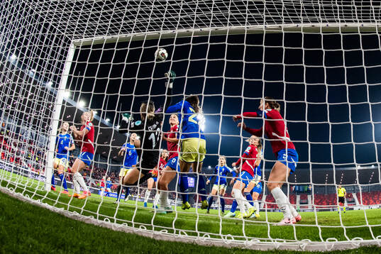 Goalkeeper Sara Cetinja and Violeta Slovic of Serbia