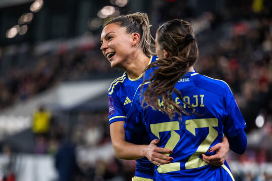 Johanna Rytting Kaneryd celebrates with Rusul Rosa Kafaji