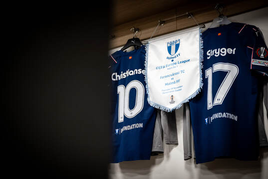 The pennant and the kits of Anders Christiansen and Jens