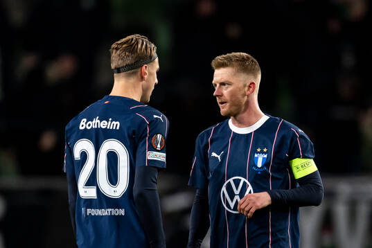 Erik Botheim and Anders Christiansen of Malmö FF look
