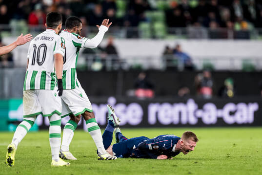 Habib Maiga of Ferencvaros and Anders Christiansen of