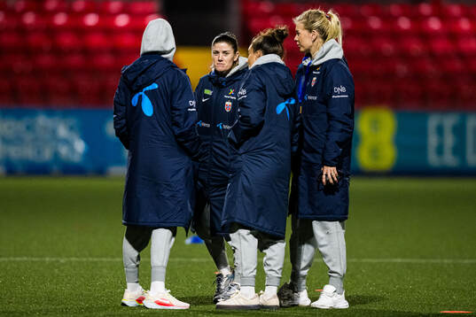 Maren Mjelde and Ada Stolsmo Hegerberg of Norway