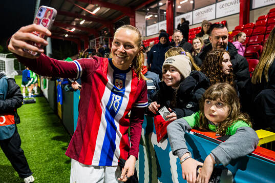 Frida Maanum of Norway taking a selfie with a fan