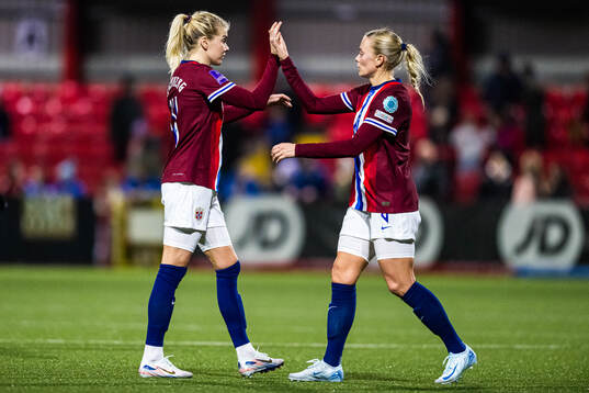 Ada Stolsmo Hegerberg and Guro Bergsvand of Norway