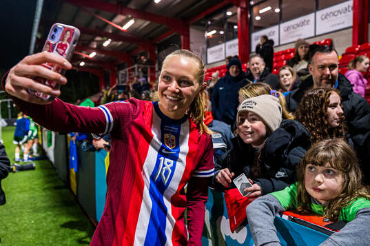 Frida Maanum of Norway taking a selfie with a fan