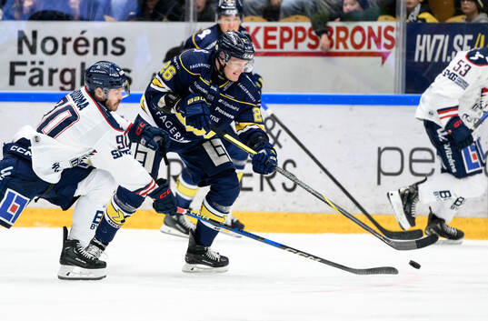 Linköpings Lance Bouma och HV71s Tommi Tikka