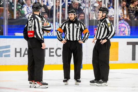 Domare Mikael Sjöqvist och Domare Mattias Enroth och