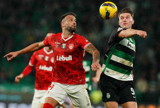 Viktor Gyokeres of Sporting CP with Luis Rocha of CD Santa