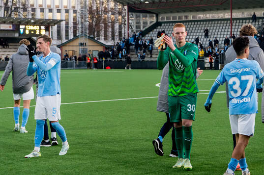 Malmö FFs Søren Rieks och målvakt Joakim Persson jublar