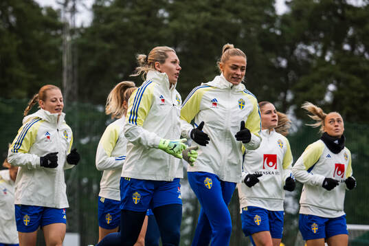 Goalkeeper Jennifer Falk and Fridolina Rolfö of the