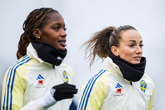 Evelyn Ijeh and Kosovare Asllani of the Swedish women's
