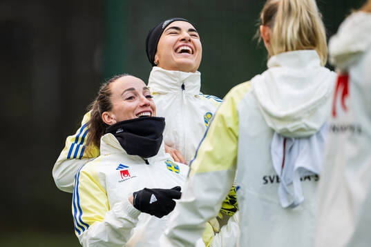 Kosovare Asllani and goalkeeper Zecira Musovic of the