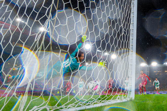 Niklas Castro of Brann scores the 1-1 goal behind