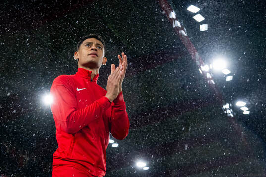 Japhet Sery Larsen of Brann enters the pitch