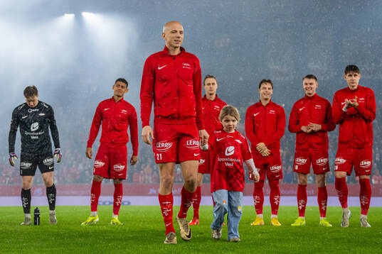 Ruben Kristiansen of Brann with his daughter