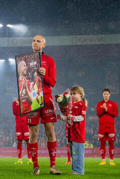 Ruben Kristiansen of Brann with his daughter