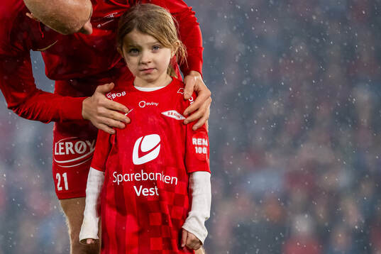 Ruben Kristiansen of Brann with his daughter