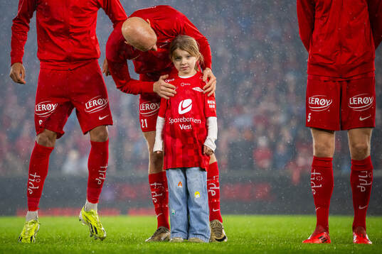 Ruben Kristiansen of Brann with his daughter