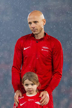 Ruben Kristiansen of Brann with his daughter