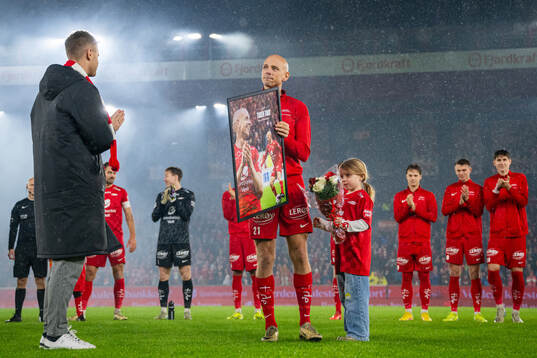 Ruben Kristiansen of Brann with his daughter