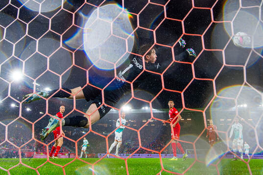 Goalkeeper Mathias Dyngeland of Brann makes a save